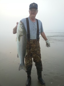 Perry catching rockfish off the beach